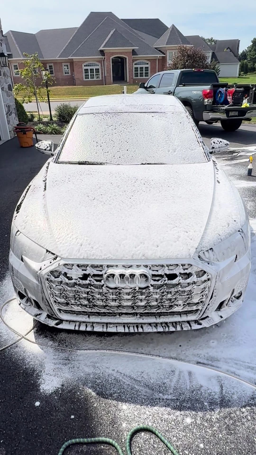 An Audi A8L during an exterior hand wash by Pure Line Auto